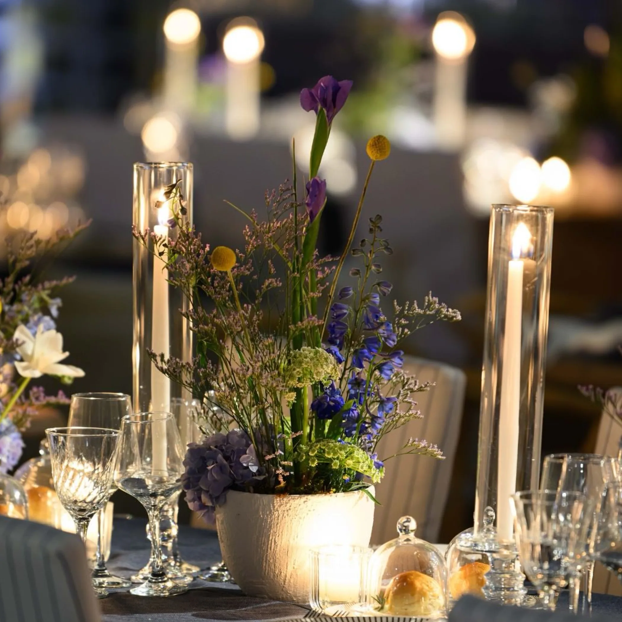 outdoor event with candles and flowers