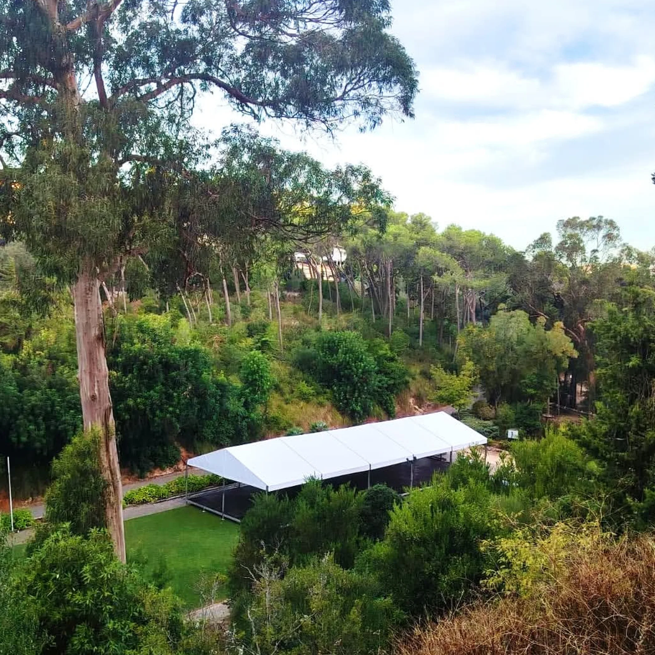 temporary event structure in lush surroundings
